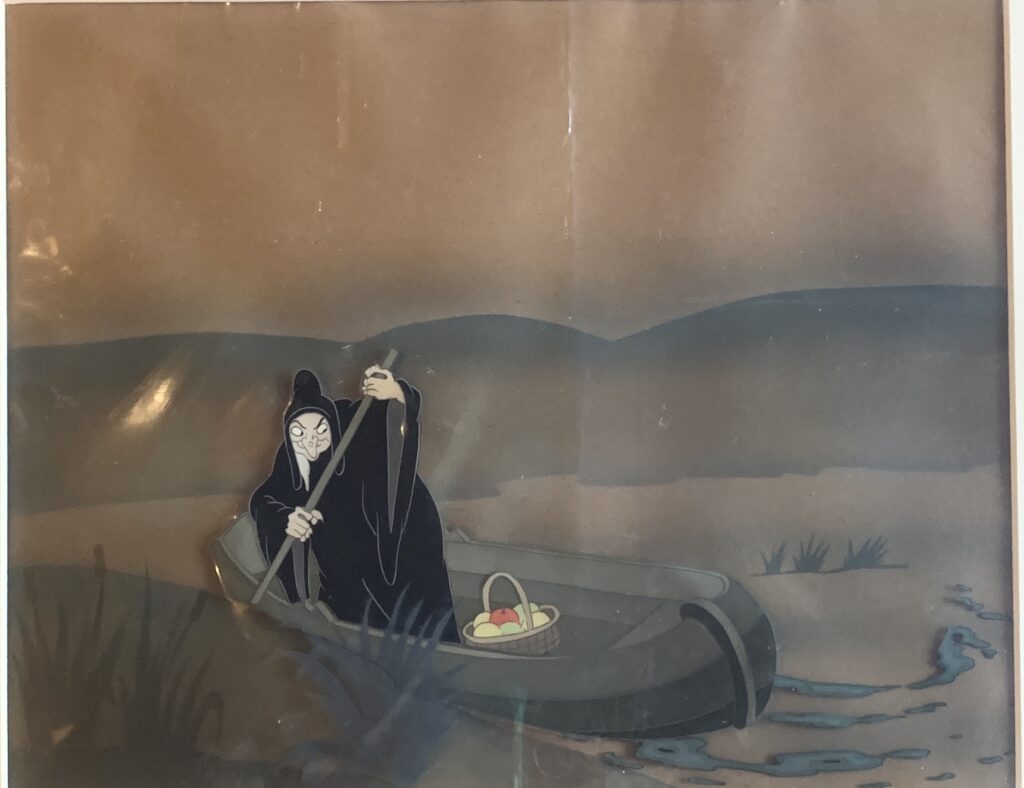 Witch in boat from Snow White and the Seven Dwarfs, 1937 original production cel, Courvoisier background