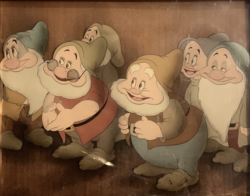 Dopey, Sneezy, Sleepy, Happy, Bashful, and Doc from Snow White and the Seven Dwarfs, 1937 original production cel, Courvoisier background $13,500.00