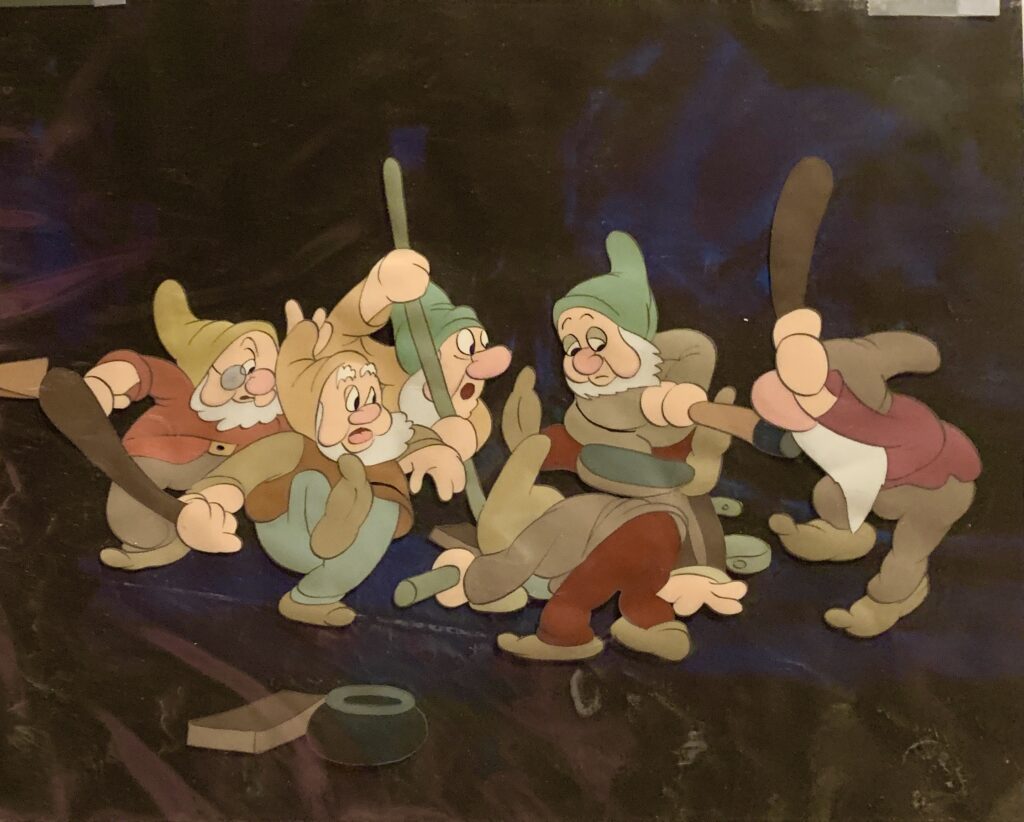 Grumpy, Sneezy, Sleepy, Happy, Bashful, and Doc from Snow White and the Seven Dwarfs, 1937 original production cel, Courvoisier background